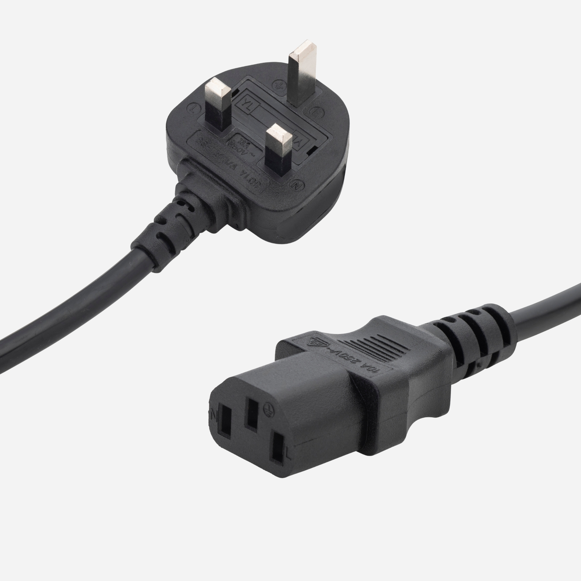 a black UK mains to C13 connector cable with a UK male mains plug connector and a C13 IEC female mains power connector