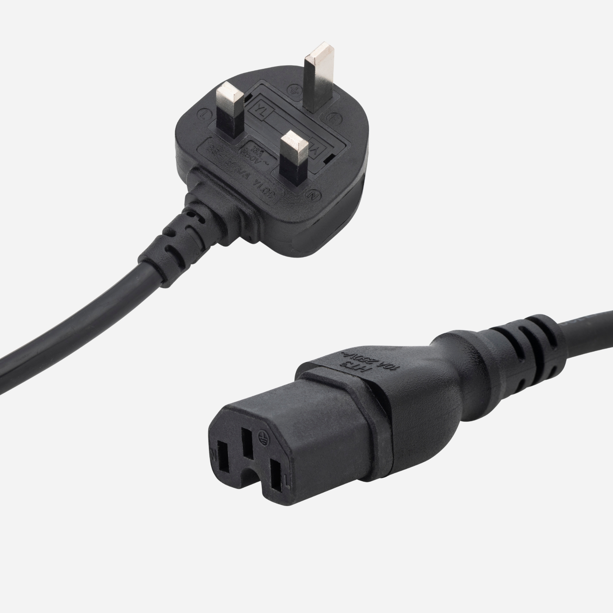 a black UK mains to C15 connector cable with a UK mains plug connector male and a C15 IEC female connector